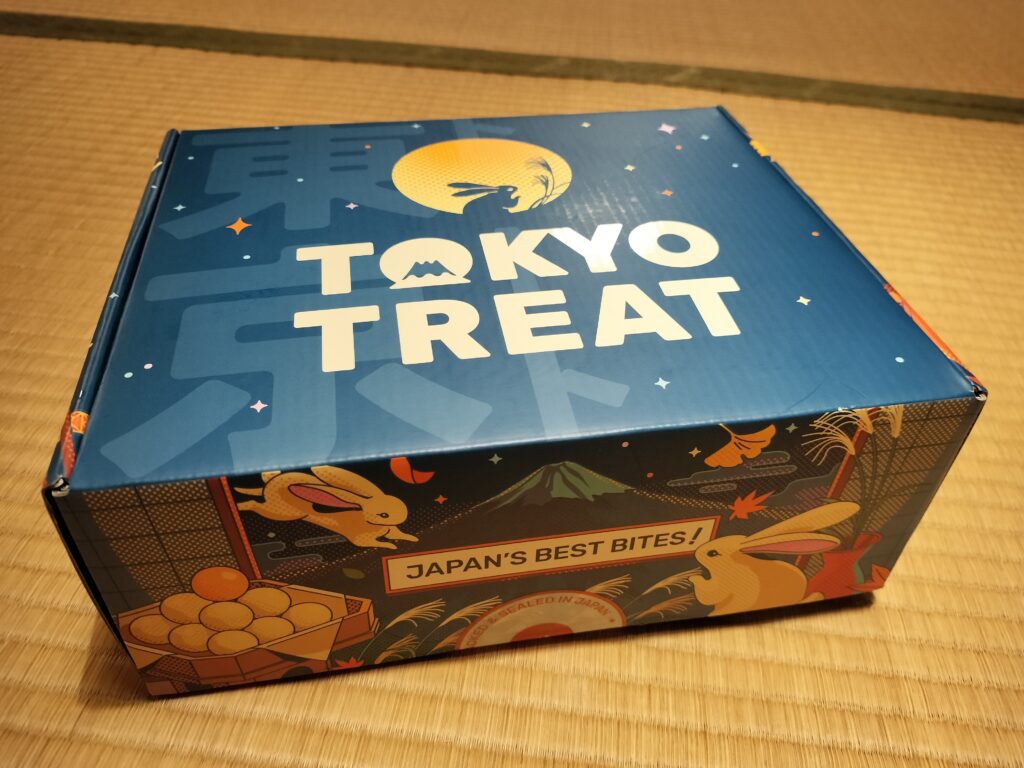 Dark blue TokyoTreat tsukimi-themed September snack box featuring cute rabbit designs, ready for unboxing.